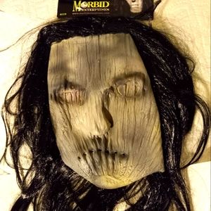 Grotesque mask with hair